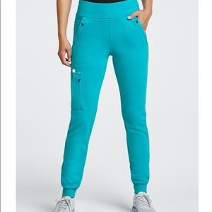 Used Jaanuu pants size regular L. Teal